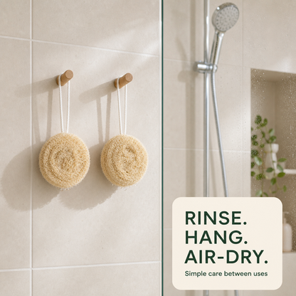 Round loofah scrubbers hanging to air dry